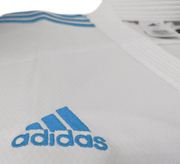 Karateanzug Adidas Kumite Adilight Primegreen WKF Blaue Streifen