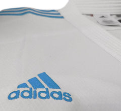Karateanzug Adidas Kumite Adilight Primegreen WKF Blaue Streifen