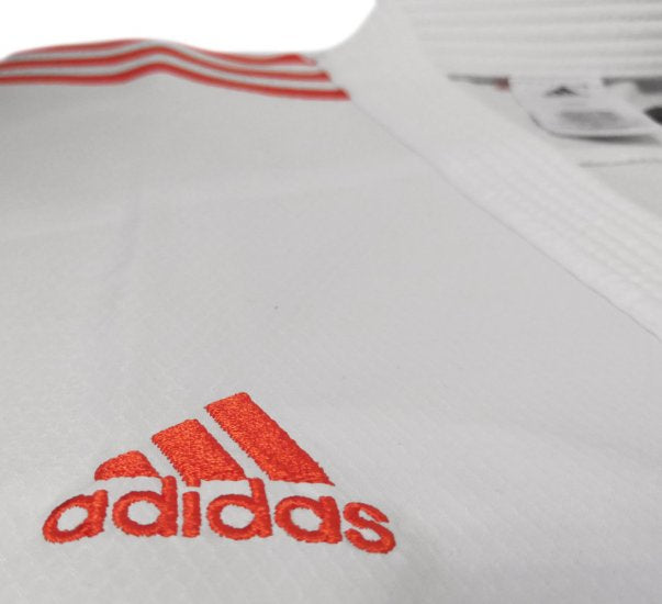 Karateanzug Adidas Kumite Adilight Primegreen WKF Rote Streifen